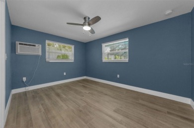 Welcome to this stunning renovated 4-bedroom, 3-bathroom pool on The Dunedin Country Club in Florida - for sale on GolfHomes.com, golf home, golf lot