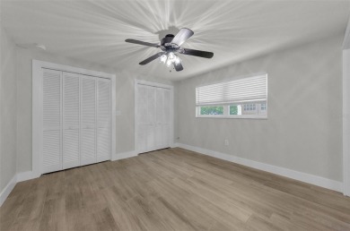 Welcome to this stunning renovated 4-bedroom, 3-bathroom pool on The Dunedin Country Club in Florida - for sale on GolfHomes.com, golf home, golf lot