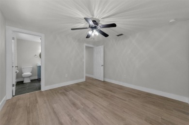 Welcome to this stunning renovated 4-bedroom, 3-bathroom pool on The Dunedin Country Club in Florida - for sale on GolfHomes.com, golf home, golf lot