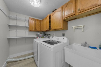Welcome to this stunning renovated 4-bedroom, 3-bathroom pool on The Dunedin Country Club in Florida - for sale on GolfHomes.com, golf home, golf lot