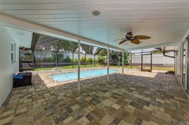 Welcome to this stunning renovated 4-bedroom, 3-bathroom pool on The Dunedin Country Club in Florida - for sale on GolfHomes.com, golf home, golf lot