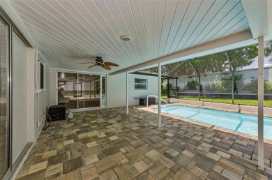 Welcome to this stunning renovated 4-bedroom, 3-bathroom pool on The Dunedin Country Club in Florida - for sale on GolfHomes.com, golf home, golf lot