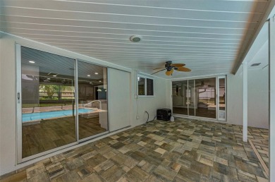 Welcome to this stunning renovated 4-bedroom, 3-bathroom pool on The Dunedin Country Club in Florida - for sale on GolfHomes.com, golf home, golf lot