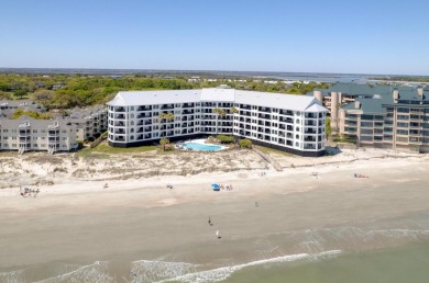 Discover this exquisite beachfront condo in the exclusive on Wild Dunes Harbor Golf Resort in South Carolina - for sale on GolfHomes.com, golf home, golf lot