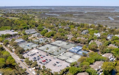 Discover this exquisite beachfront condo in the exclusive on Wild Dunes Harbor Golf Resort in South Carolina - for sale on GolfHomes.com, golf home, golf lot
