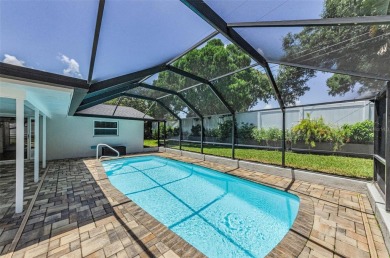 Welcome to this stunning renovated 4-bedroom, 3-bathroom pool on The Dunedin Country Club in Florida - for sale on GolfHomes.com, golf home, golf lot