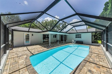 Welcome to this stunning renovated 4-bedroom, 3-bathroom pool on The Dunedin Country Club in Florida - for sale on GolfHomes.com, golf home, golf lot