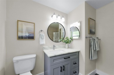 Welcome to this stunning renovated 4-bedroom, 3-bathroom pool on The Dunedin Country Club in Florida - for sale on GolfHomes.com, golf home, golf lot