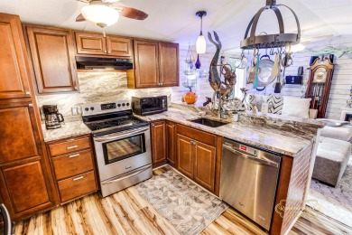 This a beautiful home located in Crystal Lake community located on Prestwick Country Club in South Carolina - for sale on GolfHomes.com, golf home, golf lot