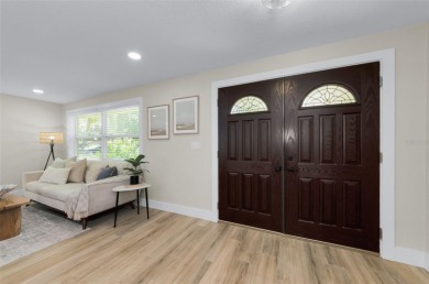 Welcome to this stunning renovated 4-bedroom, 3-bathroom pool on The Dunedin Country Club in Florida - for sale on GolfHomes.com, golf home, golf lot