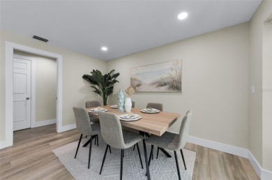 Welcome to this stunning renovated 4-bedroom, 3-bathroom pool on The Dunedin Country Club in Florida - for sale on GolfHomes.com, golf home, golf lot