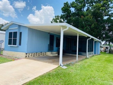 This home is in a 55 plus community with a monthly lot rent of on Crystal Lake Club in Florida - for sale on GolfHomes.com, golf home, golf lot