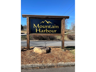 Golf course lot located in the prestigious Mountain Harbour on Chatuge Shores Golf Course in North Carolina - for sale on GolfHomes.com, golf home, golf lot