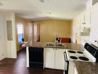 This home is in a 55 plus community with a monthly lot rent of on Crystal Lake Club in Florida - for sale on GolfHomes.com, golf home, golf lot