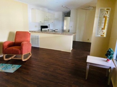This home is in a 55 plus community with a monthly lot rent of on Crystal Lake Club in Florida - for sale on GolfHomes.com, golf home, golf lot