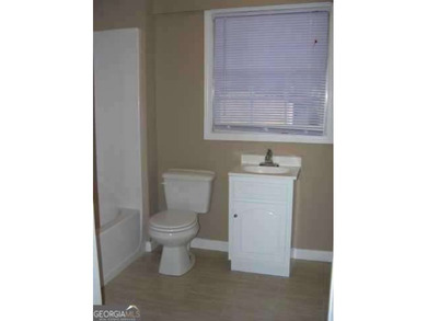 Fixer Upper opportunity in the desirable East Lake area! Solid on East Lake Golf Club in Georgia - for sale on GolfHomes.com, golf home, golf lot