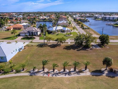Spanning more than a quarter acre and overlooking the pristine on Saint Andrews South Golf Club in Florida - for sale on GolfHomes.com, golf home, golf lot