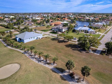 Spanning more than a quarter acre and overlooking the pristine on Saint Andrews South Golf Club in Florida - for sale on GolfHomes.com, golf home, golf lot