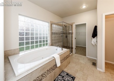 Great 1 level living in this immaculate 3788 sq ft 4 bedroom & on Pine Creek Golf Club in Colorado - for sale on GolfHomes.com, golf home, golf lot