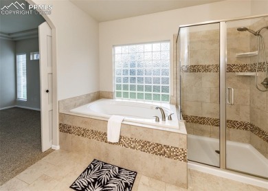 Great 1 level living in this immaculate 3788 sq ft 4 bedroom & on Pine Creek Golf Club in Colorado - for sale on GolfHomes.com, golf home, golf lot