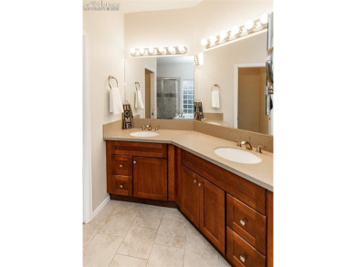 Great 1 level living in this immaculate 3788 sq ft 4 bedroom & on Pine Creek Golf Club in Colorado - for sale on GolfHomes.com, golf home, golf lot