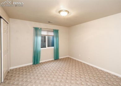 Great 1 level living in this immaculate 3788 sq ft 4 bedroom & on Pine Creek Golf Club in Colorado - for sale on GolfHomes.com, golf home, golf lot