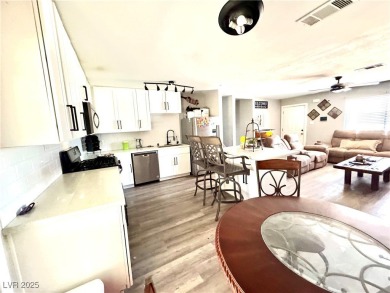 The home has undergone recent renovations, featuring updated on Desert Rose Golf Course in Nevada - for sale on GolfHomes.com, golf home, golf lot