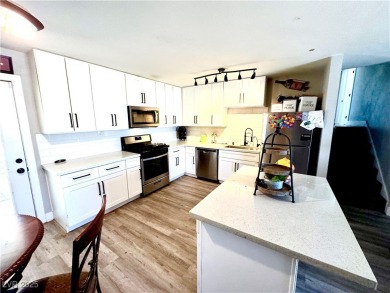 The home has undergone recent renovations, featuring updated on Desert Rose Golf Course in Nevada - for sale on GolfHomes.com, golf home, golf lot