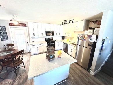 The home has undergone recent renovations, featuring updated on Desert Rose Golf Course in Nevada - for sale on GolfHomes.com, golf home, golf lot