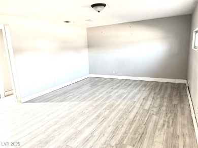 The home has undergone recent renovations, featuring updated on Desert Rose Golf Course in Nevada - for sale on GolfHomes.com, golf home, golf lot