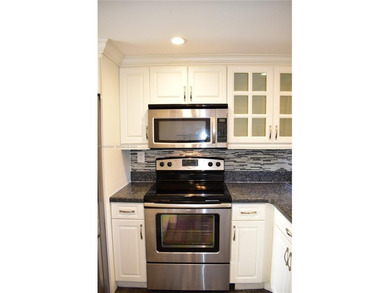 Great price reduction on a ready to enjoy condo in Phase 3! on Sunrise Lakes Phase III in Florida - for sale on GolfHomes.com, golf home, golf lot