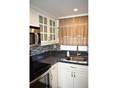 Great price reduction on a ready to enjoy condo in Phase 3! on Sunrise Lakes Phase III in Florida - for sale on GolfHomes.com, golf home, golf lot