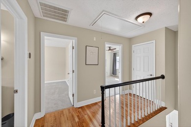 Nestled in the desirable Houndslake neighborhood, this inviting on Houndslake Country Club in South Carolina - for sale on GolfHomes.com, golf home, golf lot