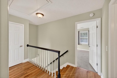 Nestled in the desirable Houndslake neighborhood, this inviting on Houndslake Country Club in South Carolina - for sale on GolfHomes.com, golf home, golf lot