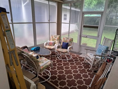 Located in a very active 55+ community close to shopping on Golden Lakes Golf Course in Florida - for sale on GolfHomes.com, golf home, golf lot