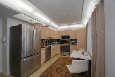 Top-Floor Gem Priced to Sell!This partially updated top-floor on  in Florida - for sale on GolfHomes.com, golf home, golf lot