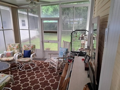 Located in a very active 55+ community close to shopping on Golden Lakes Golf Course in Florida - for sale on GolfHomes.com, golf home, golf lot