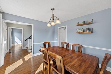 Nestled in the desirable Houndslake neighborhood, this inviting on Houndslake Country Club in South Carolina - for sale on GolfHomes.com, golf home, golf lot