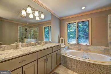 Introducing this Exquisite home in prestigious Huntcliff on Cherokee Town and Country Club in Georgia - for sale on GolfHomes.com, golf home, golf lot