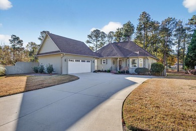Beautiful home in the gated Woodside community, perfectly on Woodside Plantation Country Club in South Carolina - for sale on GolfHomes.com, golf home, golf lot