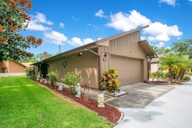 Beautifully updated single-family patio home -- move-in ready on The Country Club At Deer Run in Florida - for sale on GolfHomes.com, golf home, golf lot