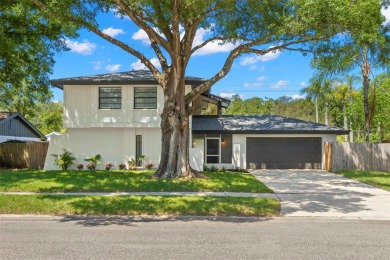 Welcome HOME!! WOW!! This completely renovated home is located on Northdale Golf and Tennis Club in Florida - for sale on GolfHomes.com, golf home, golf lot