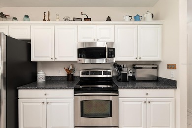 This beautifully maintained Alydar model offers 2 bedrooms, 2 on Eagle Ridge At Spruce Creek Country Club in Florida - for sale on GolfHomes.com, golf home, golf lot