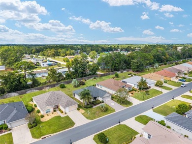 This beautifully maintained Alydar model offers 2 bedrooms, 2 on Eagle Ridge At Spruce Creek Country Club in Florida - for sale on GolfHomes.com, golf home, golf lot