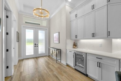 Stunning 5 bedroom, 3.5 bath Tavvo Signature home in the on Bent Pine Golf Club in Florida - for sale on GolfHomes.com, golf home, golf lot
