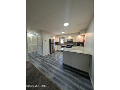 Lovely upper level Andover model with peaceful lakeviews from on Greenbriar Woodlands in New Jersey - for sale on GolfHomes.com, golf home, golf lot