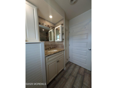 Lovely upper level Andover model with peaceful lakeviews from on Greenbriar Woodlands in New Jersey - for sale on GolfHomes.com, golf home, golf lot