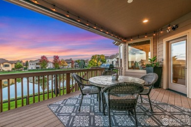 Tranquil lake views enhance the sense of calmness as you enter on Highland Meadows Golf Course in Colorado - for sale on GolfHomes.com, golf home, golf lot