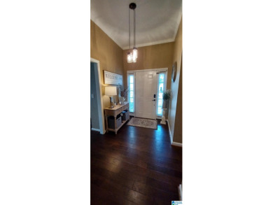 The seller has just upgraded to beautiful LVP flooring on Magnolia Meadows Golf Course in Alabama - for sale on GolfHomes.com, golf home, golf lot