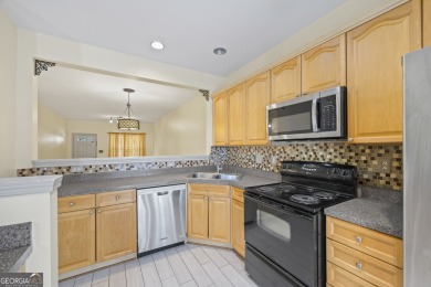 Charming  2-story townhome located in Little Suwanee Pointe on Collins Hill Golf Club in Georgia - for sale on GolfHomes.com, golf home, golf lot
